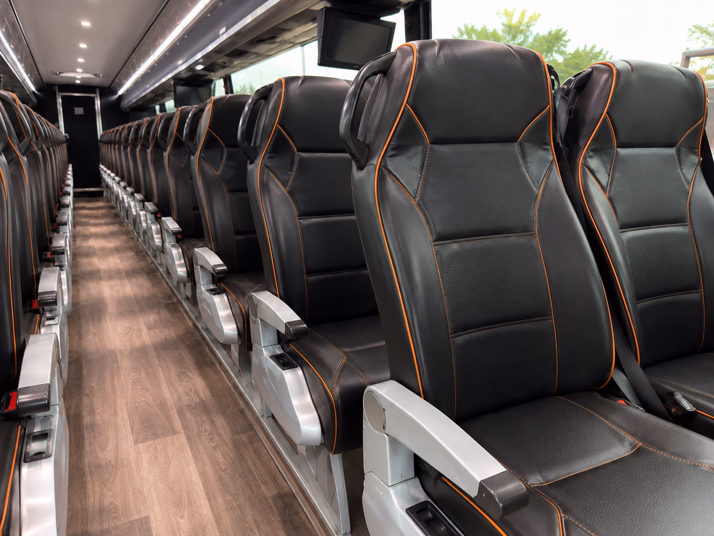 how seasonality and peak times affect charter bus rates in dearborn heights michigan